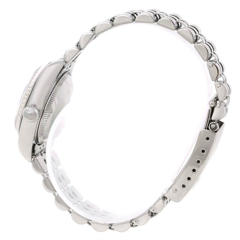 This image shows a side view of a Rolex Datejust 79174 Women
s Stainless Steel Blue Dial 79174 Women
s Stainless Steel Blue Dial watch, highlighting the crown, bracelet, and clasp.