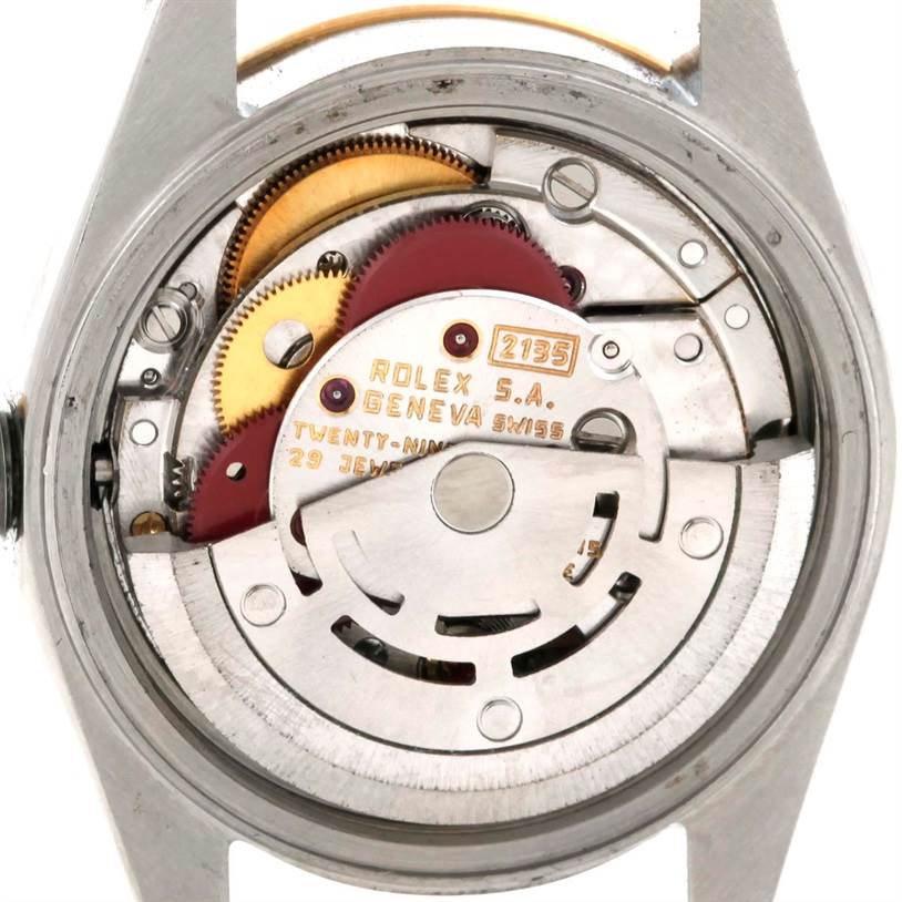 This image shows an internal mechanism and components of the Rolex Datejust 69173 Women's Stainless Steel Black Dial 69173 Women's Stainless Steel Black Dial watch, viewed from the back.