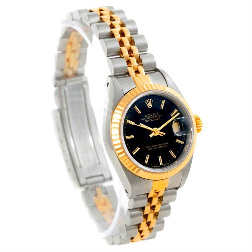 The image shows a stainless steel and gold Rolex Datejust 69173 Women's Stainless Steel Black Dial 69173 Women's Stainless Steel Black Dial watch at an angled side view, highlighting the bracelet and black dial.