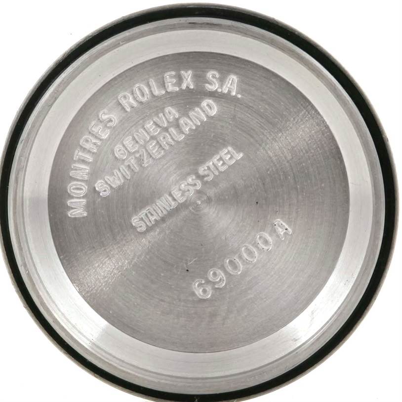 This image shows the inside of the case back for a Rolex Datejust 69174 Women's Stainless Steel Silver Dial 69174 Women's Stainless Steel Silver Dial watch, displaying its engravings and markings.