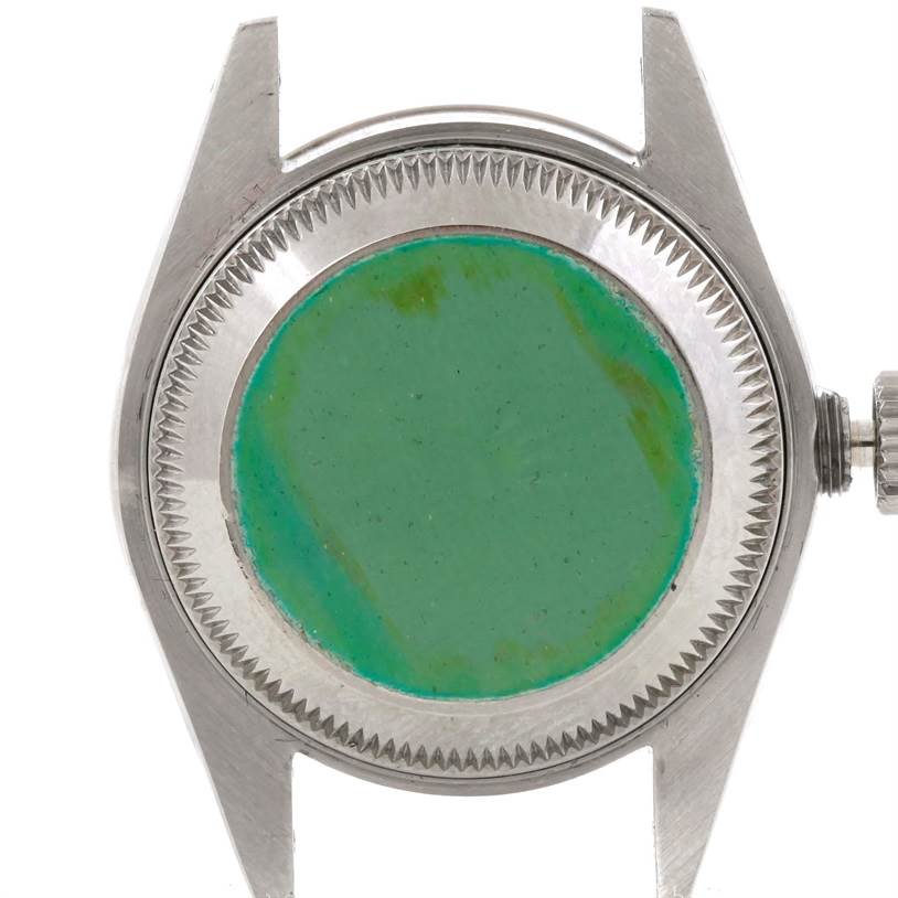 This image shows the case back and crown of a Rolex Datejust 69174 Women's Stainless Steel Silver Dial 69174 Women's Stainless Steel Silver Dial watch, viewed from the case back side.