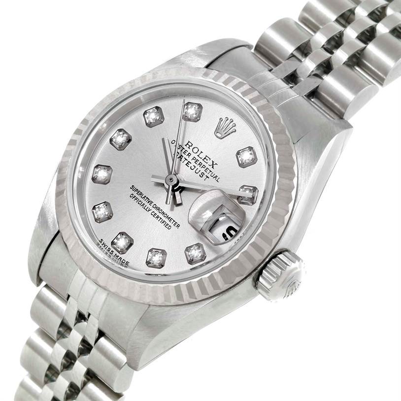 The image shows a close-up of the Rolex Datejust 79174 Women's Stainless Steel Silver Dial 79174 Women's Stainless Steel Silver Dial watch face, crown, and part of the bracelet at an angled view.