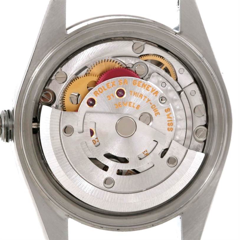 This image shows the internal mechanism of a Rolex Datejust 79174 Women's Stainless Steel Silver Dial 79174 Women's Stainless Steel Silver Dial watch, emphasizing the gears and movement components.