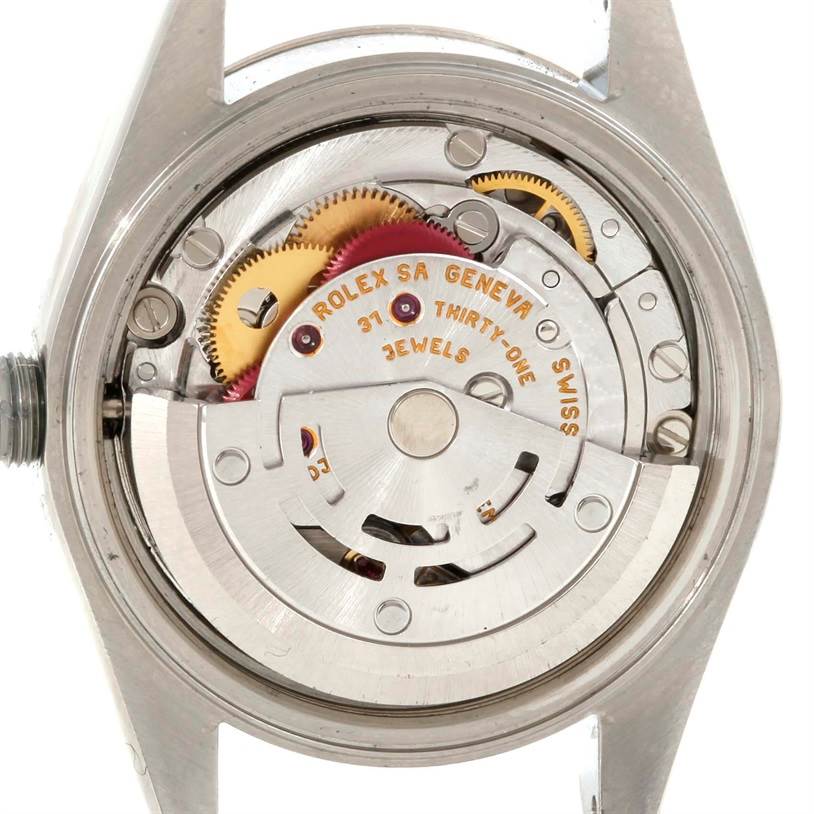 This is a rear view of the Rolex Datejust 79174 Women's Stainless Steel Blue Dial 79174 Women's Stainless Steel Blue Dial model, showing the intricate details of its movement and gears.