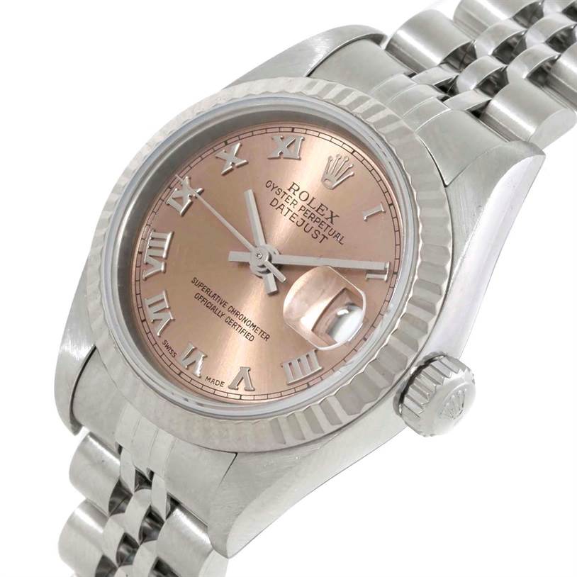 The image shows a close-up angled view of the Rolex Datejust 79174 Women's Stainless Steel Pink Dial 79174 Women's Stainless Steel Pink Dial watch, highlighting its dial, bezel, crown, and part of the bracelet.