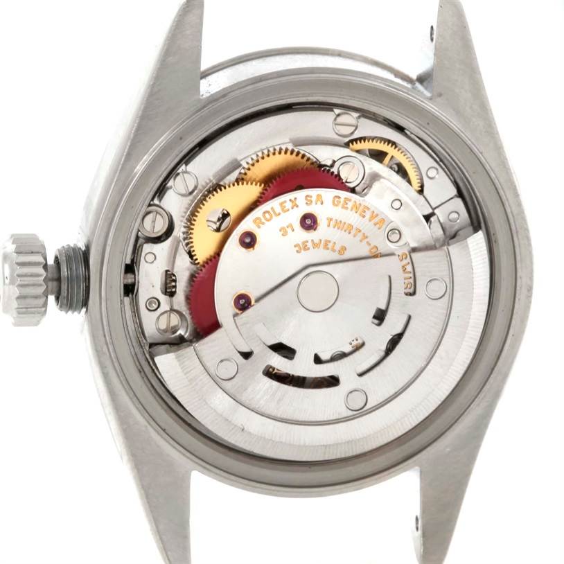 The image shows the inner mechanical movement and components of a Rolex Datejust 79174 Women's Stainless Steel Silver Dial 79174 Women's Stainless Steel Silver Dial watch from a rear angle.