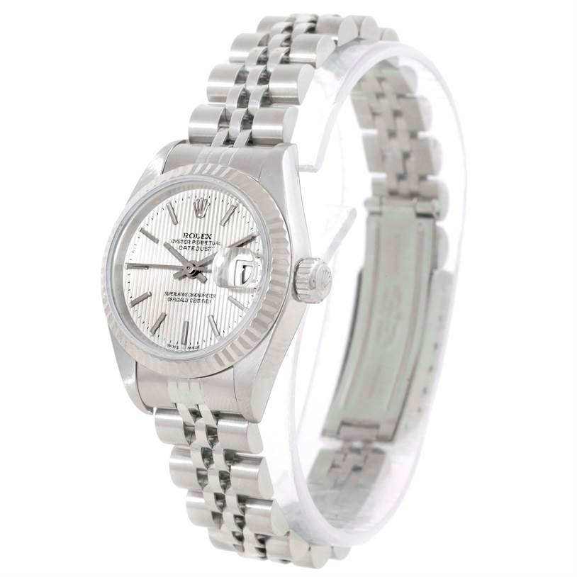 This image shows a Rolex Datejust 79174 Women's Stainless Steel Silver Dial 79174 Women's Stainless Steel Silver Dial watch from a three-quarter angle highlighting its face, bezel, crown, and Jubilee bracelet.