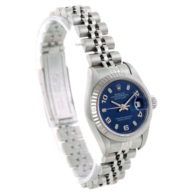 The Rolex Datejust 69174 Women's Stainless Steel Blue Dial 69174 Women's Stainless Steel Blue Dial watch is shown at a slight angle, displaying its blue dial, bezel, and part of the bracelet.