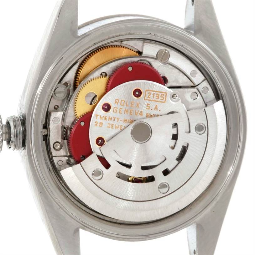 The image shows the internal mechanism of a Rolex Datejust 69174 Women's Stainless Steel Blue Dial 69174 Women's Stainless Steel Blue Dial watch, viewed from the back with the case open.