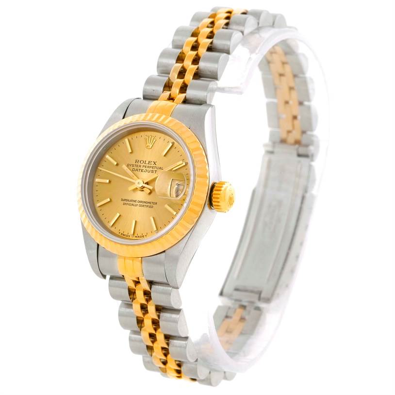 The image shows a Rolex Datejust 69173 Women's Stainless Steel Champagne Dial 69173 Women's Stainless Steel Champagne Dial watch from an oblique angle, featuring its dial, fluted bezel, and two-tone Jubilee bracelet.