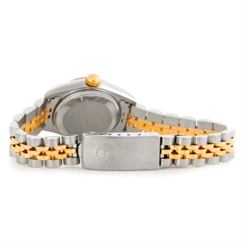 This image shows the back view of the Rolex Datejust 69173 Women's Stainless Steel Champagne Dial 69173 Women's Stainless Steel Champagne Dial watch, focusing on its case back, two-tone bracelet, and clasp.