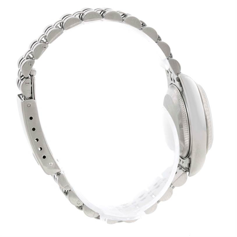 The image shows the side angle of a Rolex Datejust 79174 Women's Stainless Steel Silver Dial 79174 Women's Stainless Steel Silver Dial watch, displaying its bracelet and case.