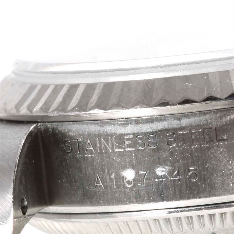 The image shows a close-up angle of the stainless steel part and the bezel of a Rolex Datejust 79174 Women's Stainless Steel Silver Dial 79174 Women's Stainless Steel Silver Dial model.