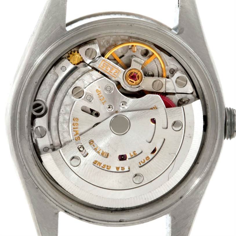 The image shows the internal mechanism and movement of a Rolex Datejust 79174 Women's Stainless Steel Silver Dial 79174 Women's Stainless Steel Silver Dial watch from the back.