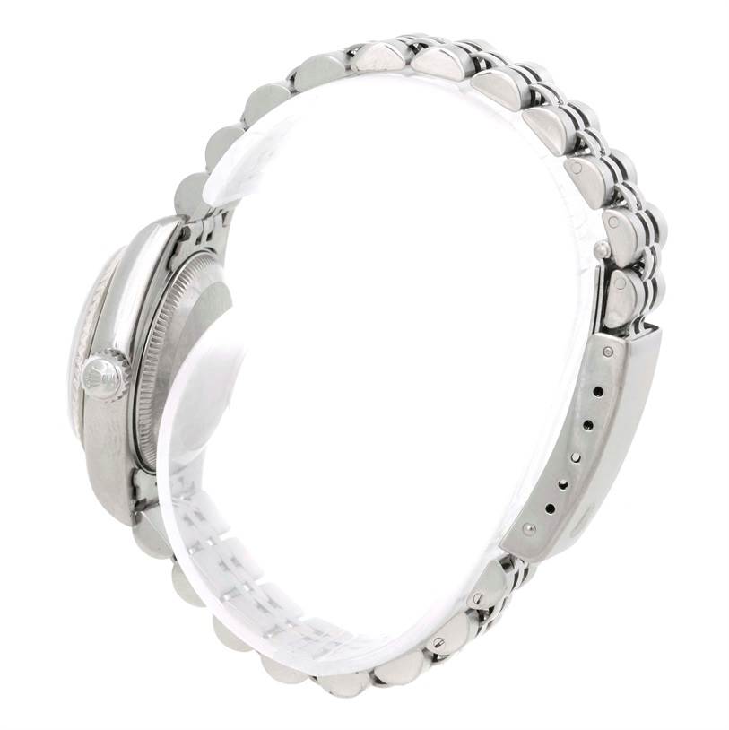 The image shows a side view of the Rolex Datejust 79174 Women's Stainless Steel Silver Dial 79174 Women's Stainless Steel Silver Dial watch, highlighting the bracelet and case.