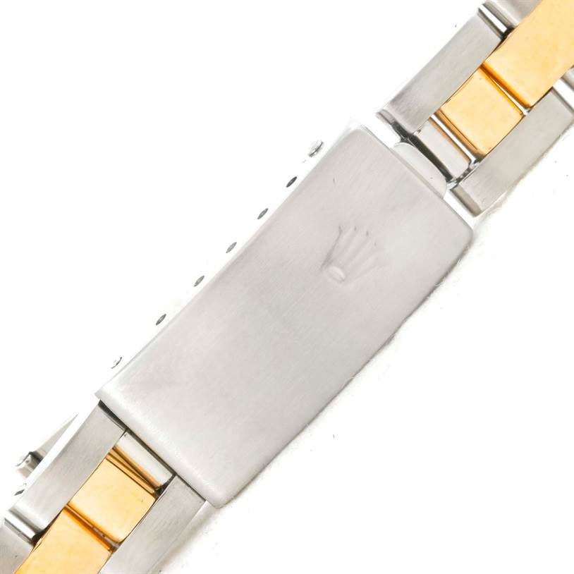 This image shows the clasp of a Rolex Datejust 69173 Women's Stainless Steel Champagne Dial 69173 Women's Stainless Steel Champagne Dial model with a two-tone metal bracelet.
