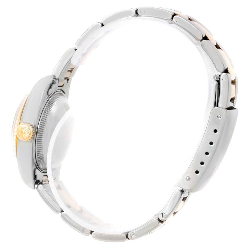 This side view shows the case and the bracelet of the Rolex Datejust 69173 Women's Stainless Steel Champagne Dial 69173 Women's Stainless Steel Champagne Dial watch.