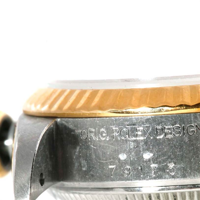 The image shows a close-up of the bezel, case, and partial crown of a Rolex Datejust 79173 Women's Stainless Steel Silver Dial 79173 Women's Stainless Steel Silver Dial watch displaying the model number.