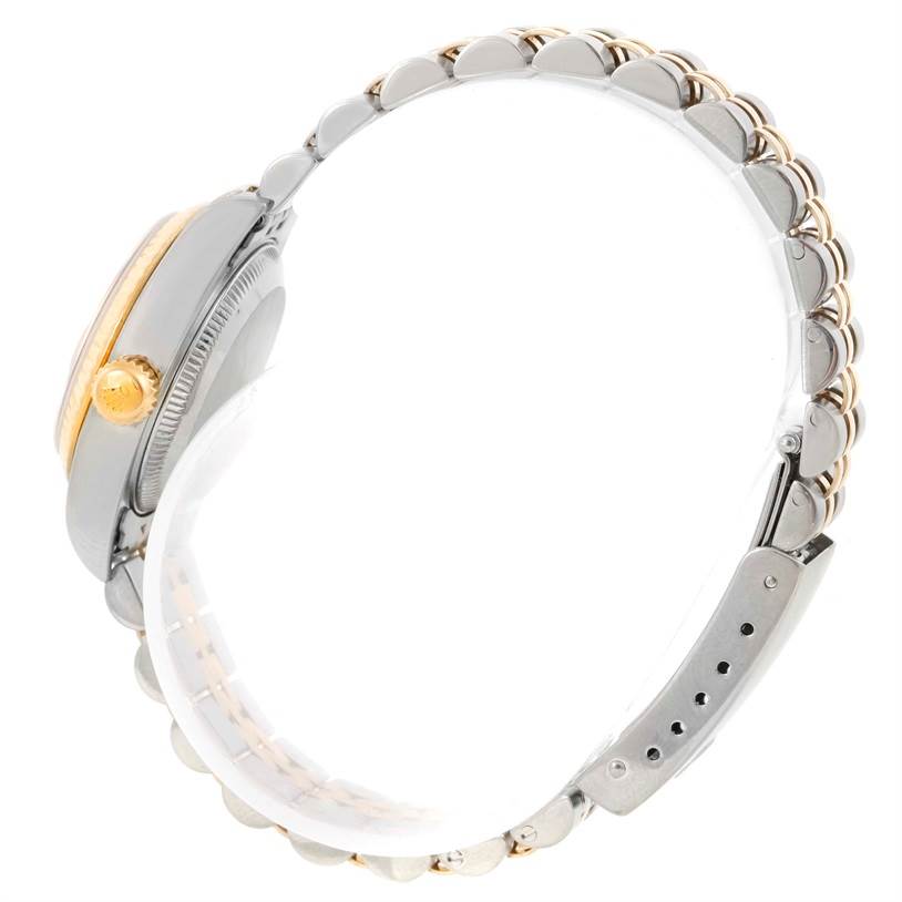 The image shows a Rolex Datejust 79173 Women's Stainless Steel Silver Dial 79173 Women's Stainless Steel Silver Dial watch from a side angle, highlighting the crown, case, and part of the bracelet.