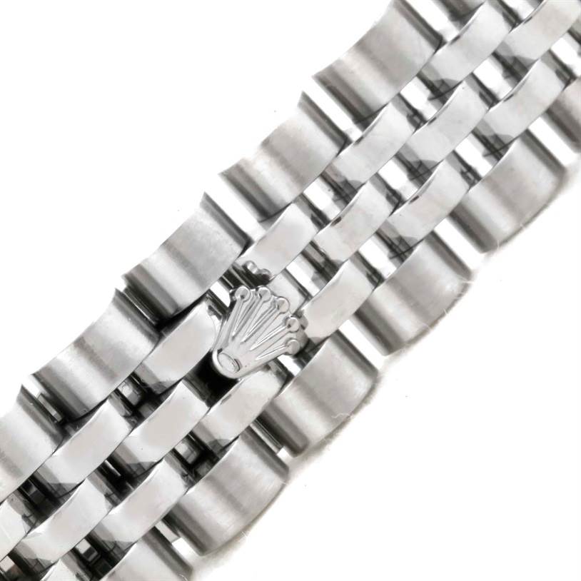 The image shows a close-up of the silver bracelet of the Rolex Datejust 179174 Women's Stainless Steel White Dial 179174 Women's Stainless Steel White Dial watch, highlighting the Rolex crown logo on the clasp.