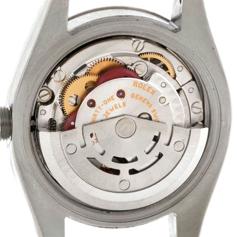 This image shows the movement mechanism and internal parts of a Rolex Datejust 179174 Women's Stainless Steel White Dial 179174 Women's Stainless Steel White Dial watch from the back.