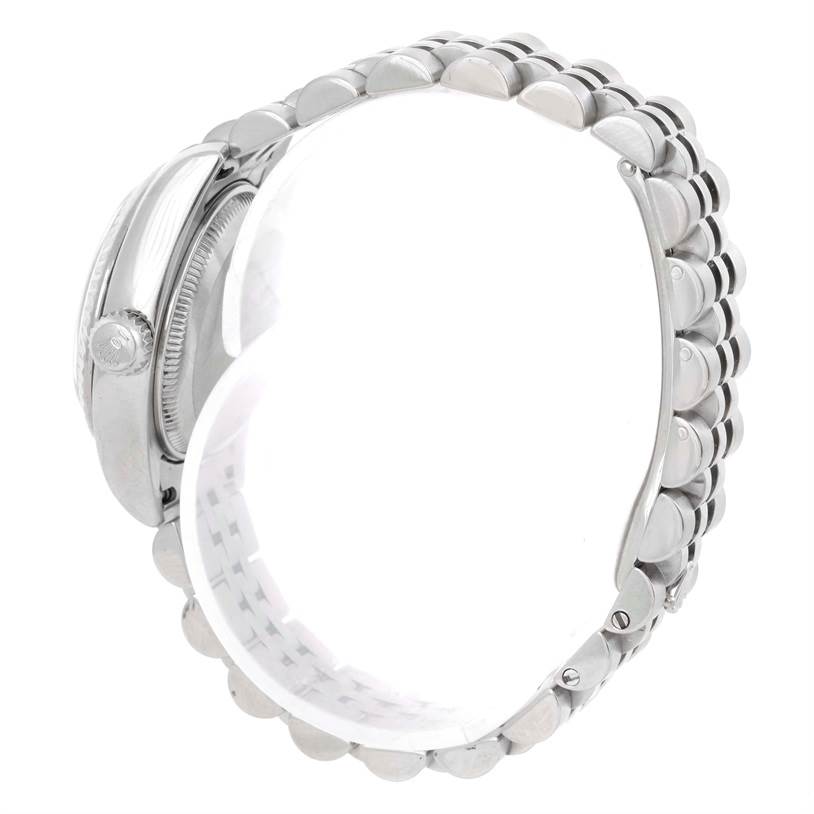 The image shows a side view of the Rolex Datejust 179174 Women's Stainless Steel White Dial 179174 Women's Stainless Steel White Dial watch, highlighting its crown and bracelet.