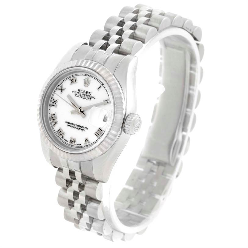 This image shows a Rolex Datejust 179174 Women's Stainless Steel White Dial 179174 Women's Stainless Steel White Dial watch viewed from a slightly angled perspective, highlighting the face, bezel, and bracelet.