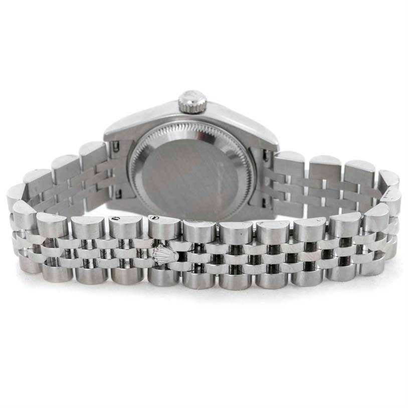 The image shows the back view of a Rolex Datejust 179174 Women's Stainless Steel White Dial 179174 Women's Stainless Steel White Dial watch, highlighting the case back and the metal bracelet.