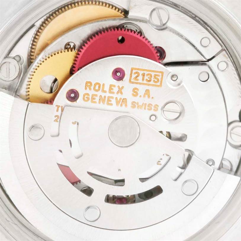 This image shows a close-up view of the internal movement mechanism of a Rolex Datejust 69173 Women
s Stainless Steel Champagne Dial 69173 Women
s Stainless Steel Champagne Dial watch.