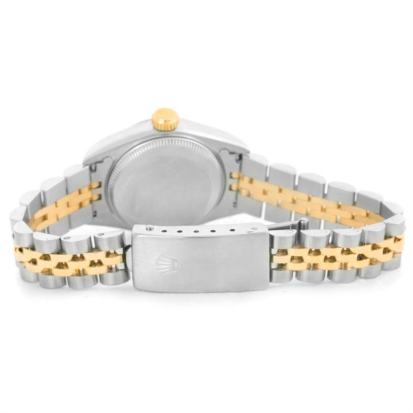 This image shows the back view of the Rolex Datejust 69173 Women
s Stainless Steel Champagne Dial 69173 Women
s Stainless Steel Champagne Dial watch, highlighting its two-tone metal bracelet and clasp.