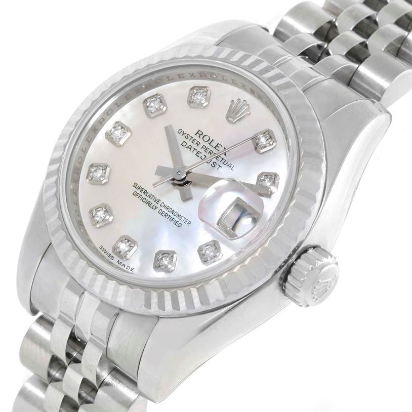 This image shows a close-up angle of a Rolex Datejust 179174 Women's Stainless Steel Mother of Pearl Dial 179174 Women's Stainless Steel Mother of Pearl Dial watch, highlighting its dial, bezel, and part of the bracelet.