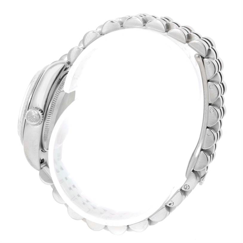 The image shows a side view of the Rolex Datejust 179174 Women's Stainless Steel Mother of Pearl Dial 179174 Women's Stainless Steel Mother of Pearl Dial model featuring its case, crown, and Jubilee bracelet.