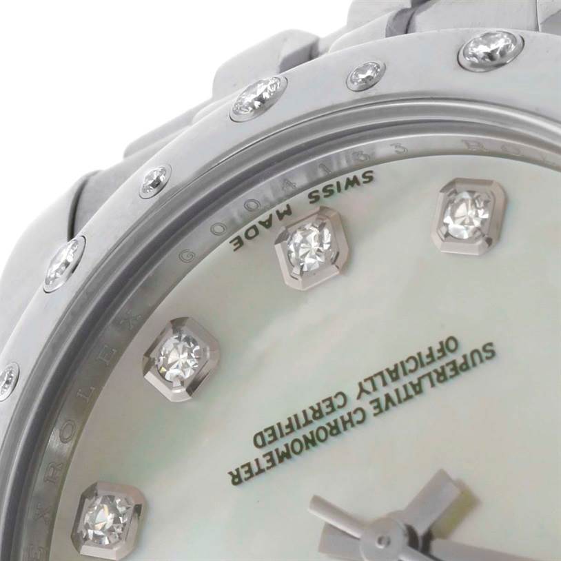 This close-up image features the bezel, dial, and diamond hour markers of a Rolex Mid-Size 178344 Women's Stainless Steel Mother of Pearl Dial 178344 Women's Stainless Steel Mother of Pearl Dial watch.