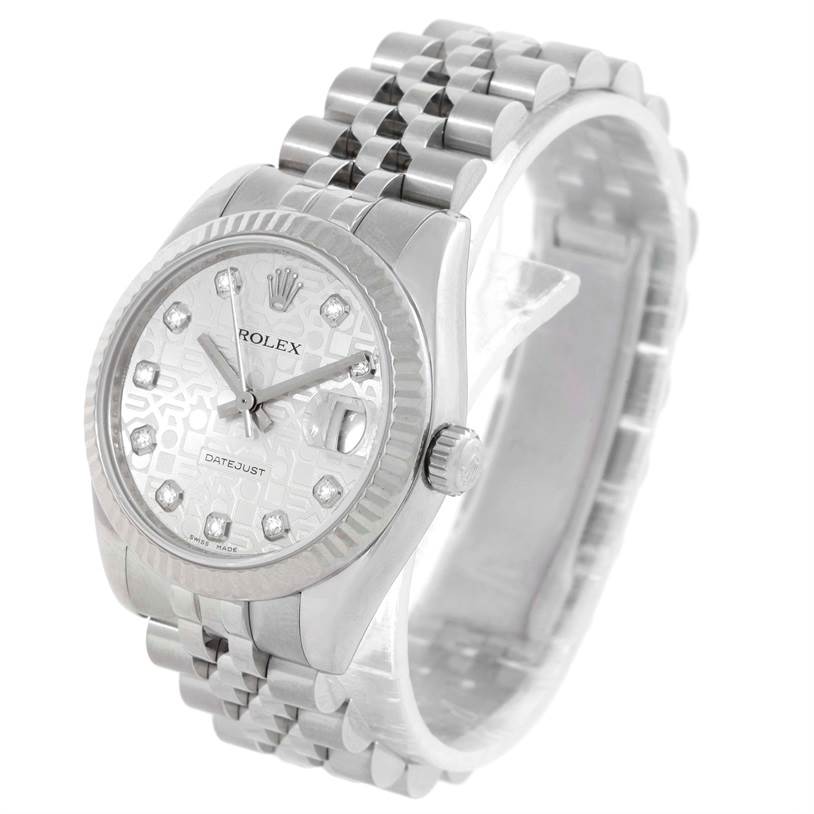 The image shows a Rolex Mid-Size 178274 Women
s Stainless Steel Silver Dial 178274 Women
s Stainless Steel Silver Dial Datejust watch in a three-quarter angle, highlighting its bracelet, dial, and crown.