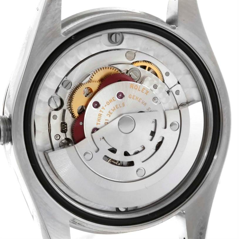 This image shows the internal mechanism and movement parts of a Rolex Mid-Size 177200 Women's Stainless Steel Silver Dial 177200 Women's Stainless Steel Silver Dial watch, viewed from the back.