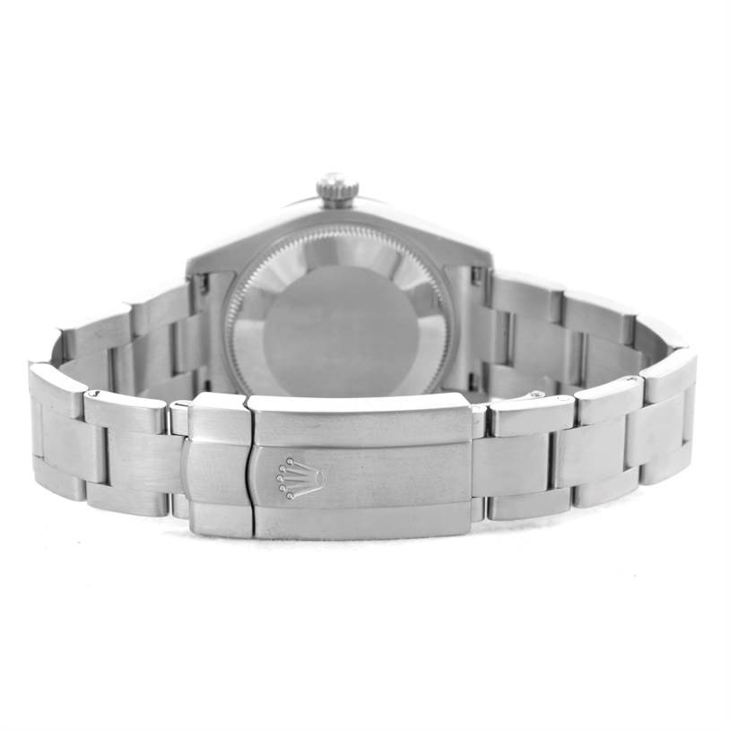 The image shows the back view of a Rolex Mid-Size 177200 Women's Stainless Steel Silver Dial 177200 Women's Stainless Steel Silver Dial model watch, including the case back and metallic bracelet.
