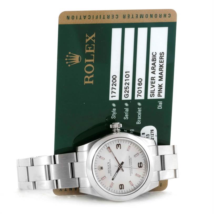This image shows a front view of a Rolex Mid-Size 177200 Women's Stainless Steel Silver Dial 177200 Women's Stainless Steel Silver Dial model watch along with its certification card.
