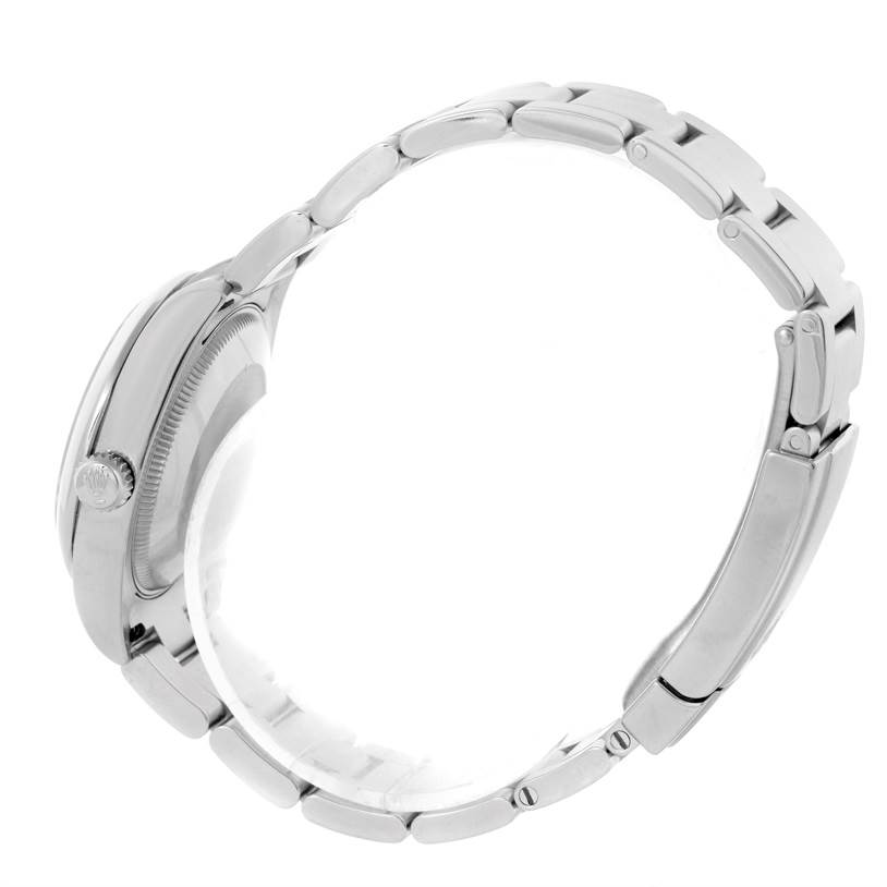 This image shows a side view of a Rolex Mid-Size 177200 Women's Stainless Steel Pink Dial 177200 Women's Stainless Steel Pink Dial watch, highlighting the case, crown, and bracelet links.