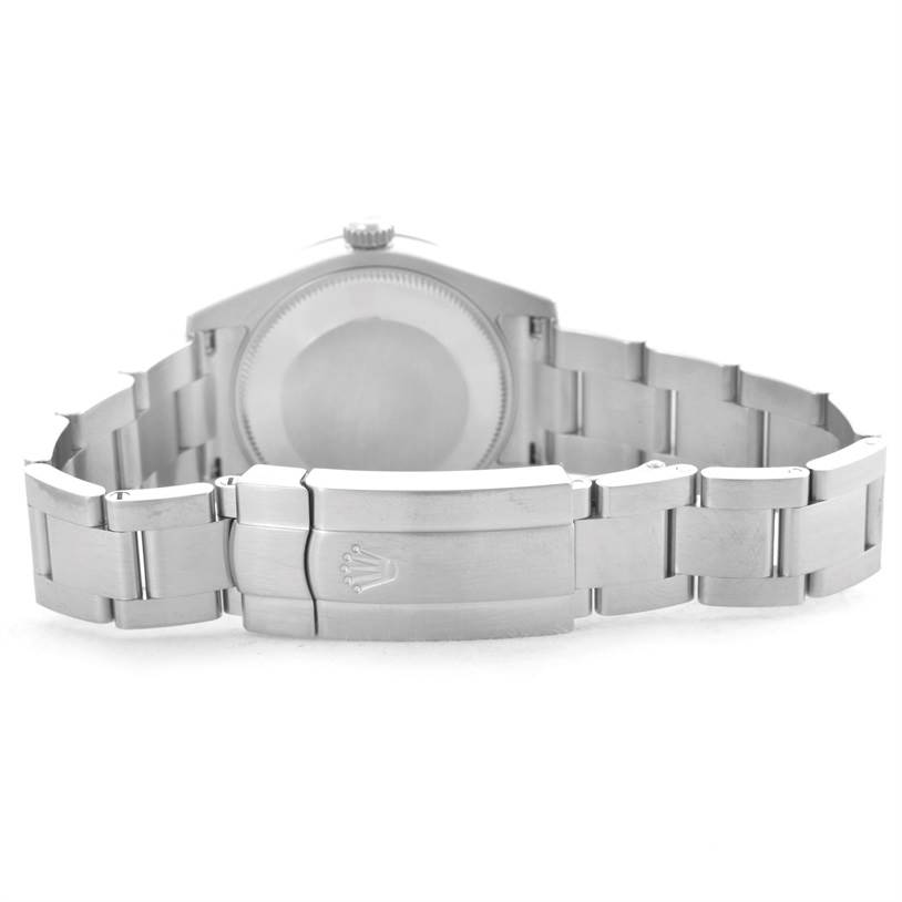 This image shows the back view of a mid-size Rolex watch, including the bracelet and clasp.