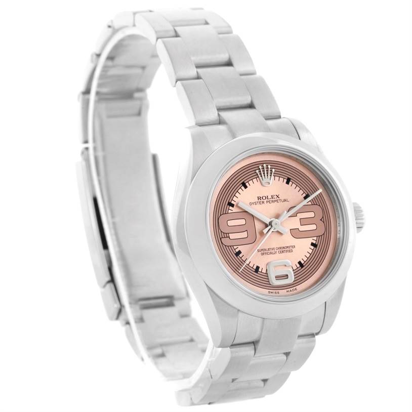 The photo shows a Rolex Oyster Perpetual Mid-Size watch from a front angle, highlighting the face, bezel, and bracelet.