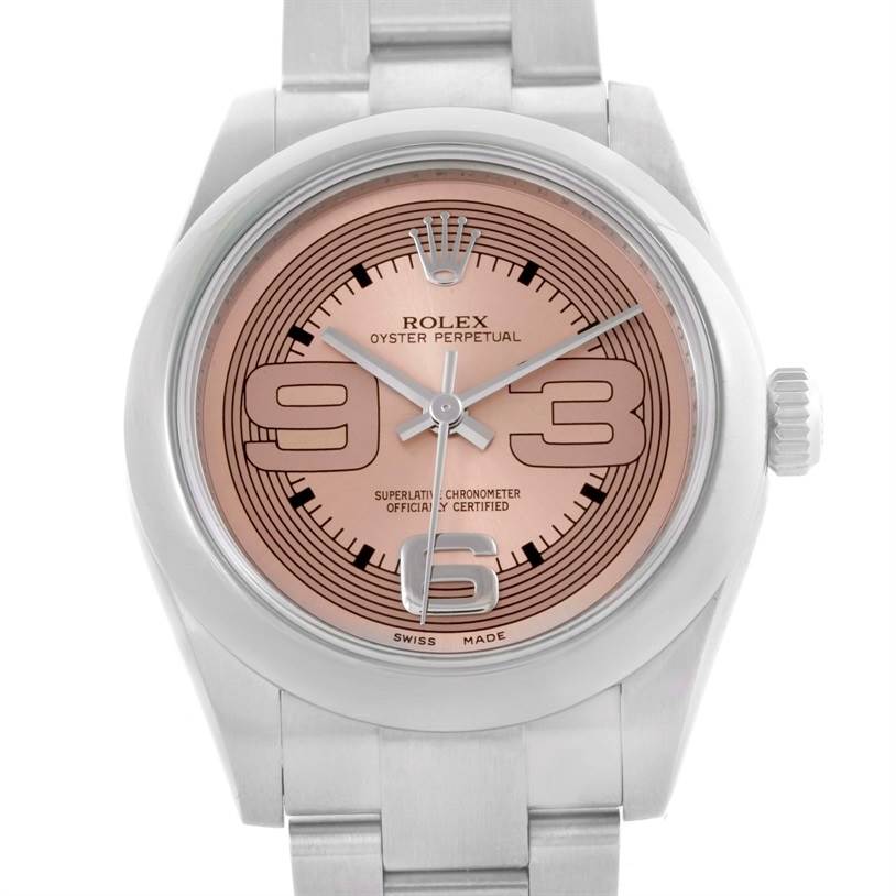 The image shows a front-facing Rolex Oyster Perpetual Mid-Size watch with a rose dial and stainless steel bracelet.