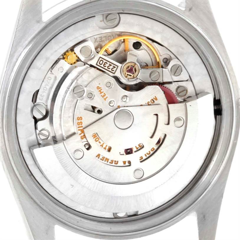 This image shows the back view of a Rolex Mid-Size 77080 Women's Stainless Steel Black Dial 77080 Women's Stainless Steel Black Dial model, displaying its intricate mechanical movement.