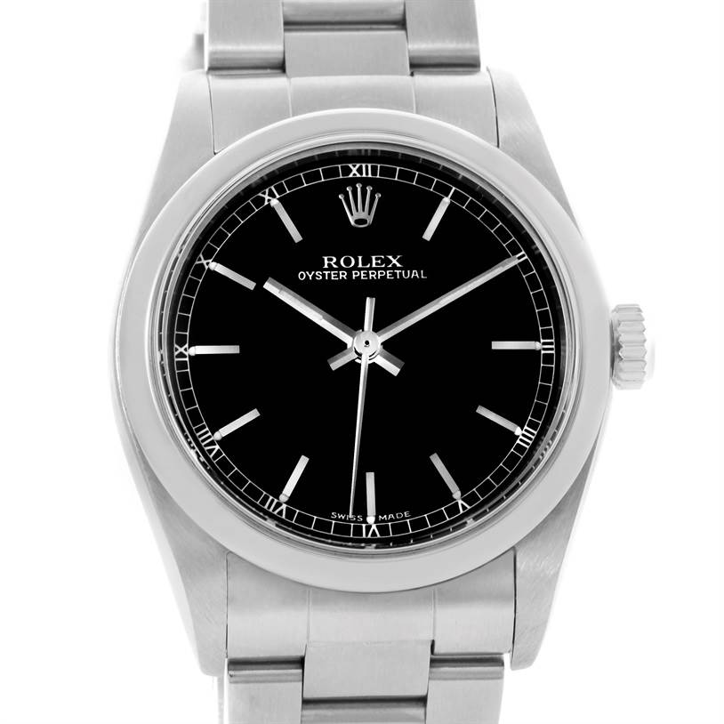 This image shows a front view of the Rolex Oyster Perpetual Mid-Size watch, featuring its black dial and metal bracelet.