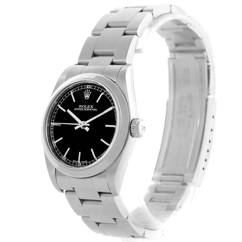 This image shows a Rolex Mid-Size 77080 Women's Stainless Steel Black Dial 77080 Women's Stainless Steel Black Dial Oyster Perpetual watch from a front-left angle, highlighting its face, bezel, and bracelet.