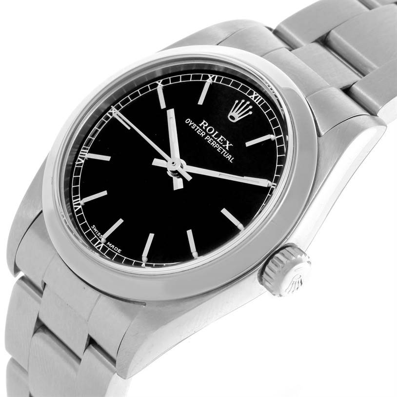 The image shows a Rolex Mid-Size 77080 Women's Stainless Steel Black Dial 77080 Women's Stainless Steel Black Dial Oyster Perpetual watch at an angled close-up, highlighting the dial, case, and bracelet.