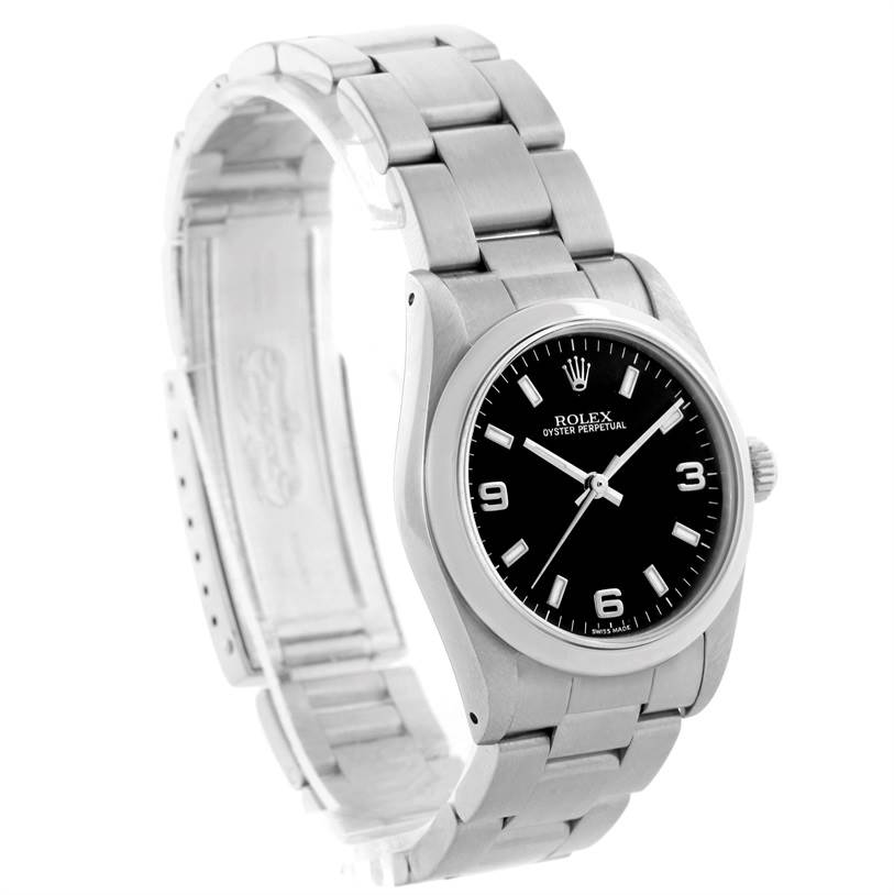 The image shows a side view angle of a Rolex Mid-Size 67480 Women's Stainless Steel Black Dial 67480 Women's Stainless Steel Black Dial watch, displaying its black dial, stainless steel bracelet, and clasp.