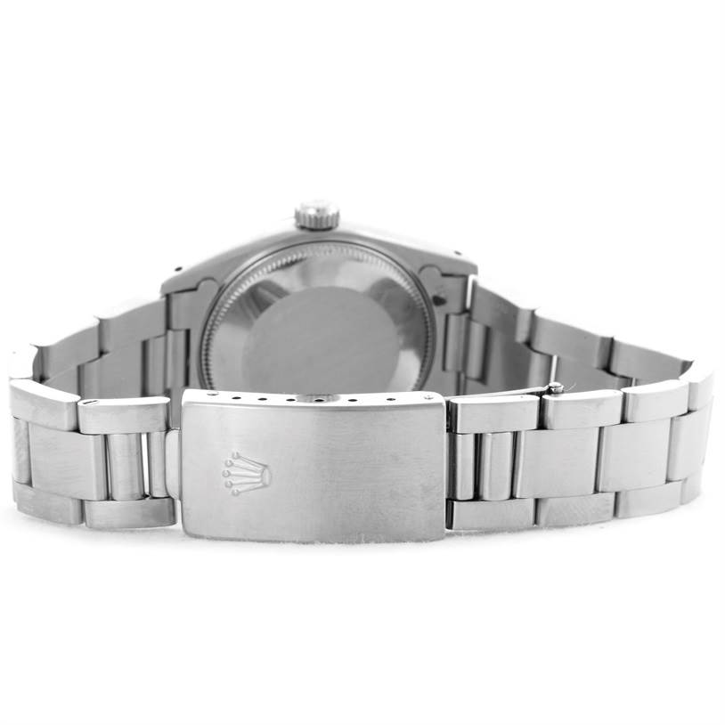 The image shows the back and the bracelet clasp of a Rolex Mid-Size 67480 Women's Stainless Steel Black Dial 67480 Women's Stainless Steel Black Dial model watch.