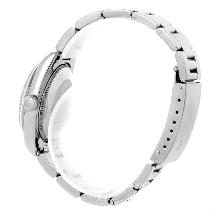 This Rolex Mid-Size 78274 Women's Stainless Steel White Dial 78274 Women's Stainless Steel White Dial watch is shown from the side, highlighting the crown, case, and bracelet.