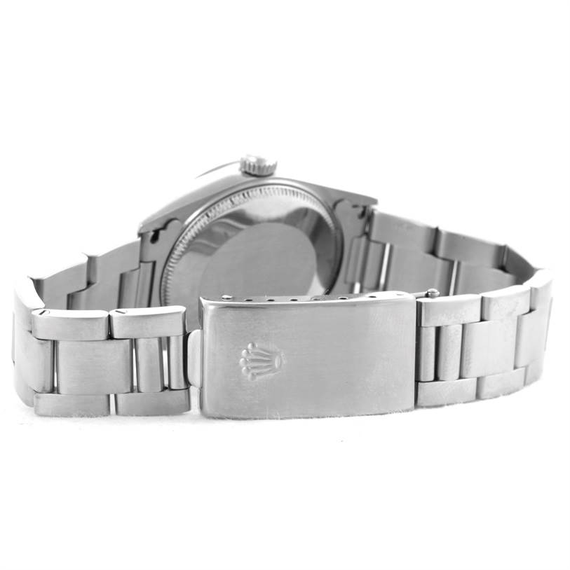 The image shows the back and clasp of a Rolex Mid-Size 78274 Women's Stainless Steel White Dial 78274 Women's Stainless Steel White Dial model, highlighting the metal bracelet and case back.