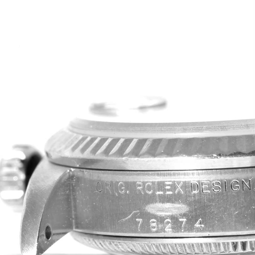 This image shows a side view of the case and bezel of a Mid-Size Rolex watch, highlighting the model number 78274 and brand engraving.